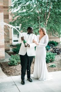 cork popping celebration annie lane bridal garments